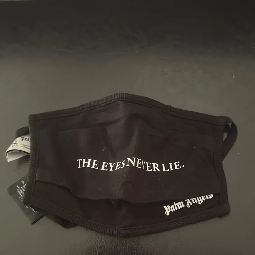 Authentic palm angels face mask comes with original bag.